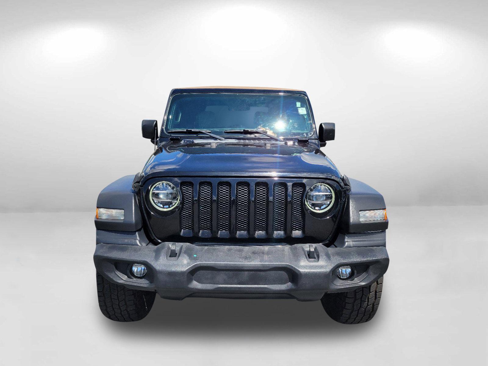 2020 Black Clearcoat /Heritage Tan/Black Jeep Wrangler Unlimited Black and Tan (1C4HJXDG9LW) with an Regular Unleaded V-6 3.6 L/220 engine, 8-Speed Automatic w/OD transmission, located at 1430 Gateway Drive, Opelika, AL, 36801, (334) 239-0944, 32.637871, -85.409790 - 2020 Jeep Wrangler Unlimited Black and Tan - Photo#1