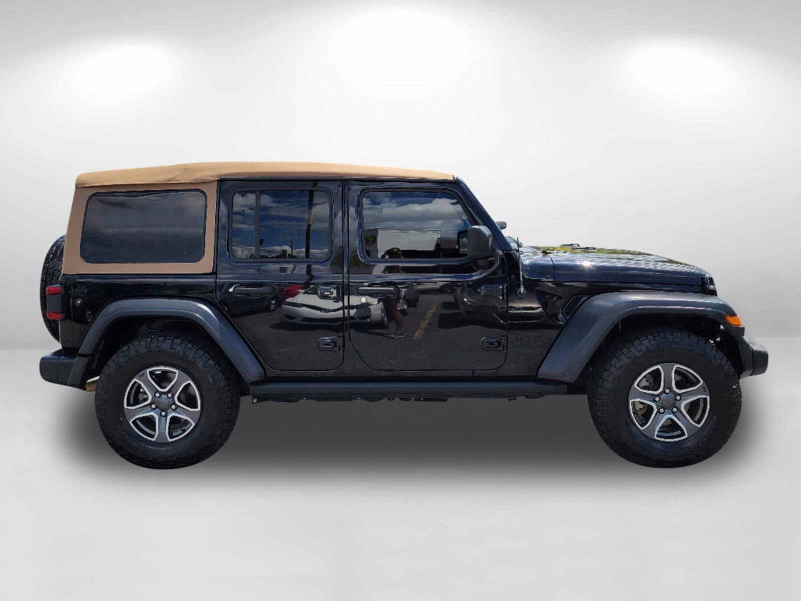 2020 Black Clearcoat /Heritage Tan/Black Jeep Wrangler Unlimited Black and Tan (1C4HJXDG9LW) with an Regular Unleaded V-6 3.6 L/220 engine, 8-Speed Automatic w/OD transmission, located at 1430 Gateway Drive, Opelika, AL, 36801, (334) 239-0944, 32.637871, -85.409790 - 2020 Jeep Wrangler Unlimited Black and Tan - Photo#3