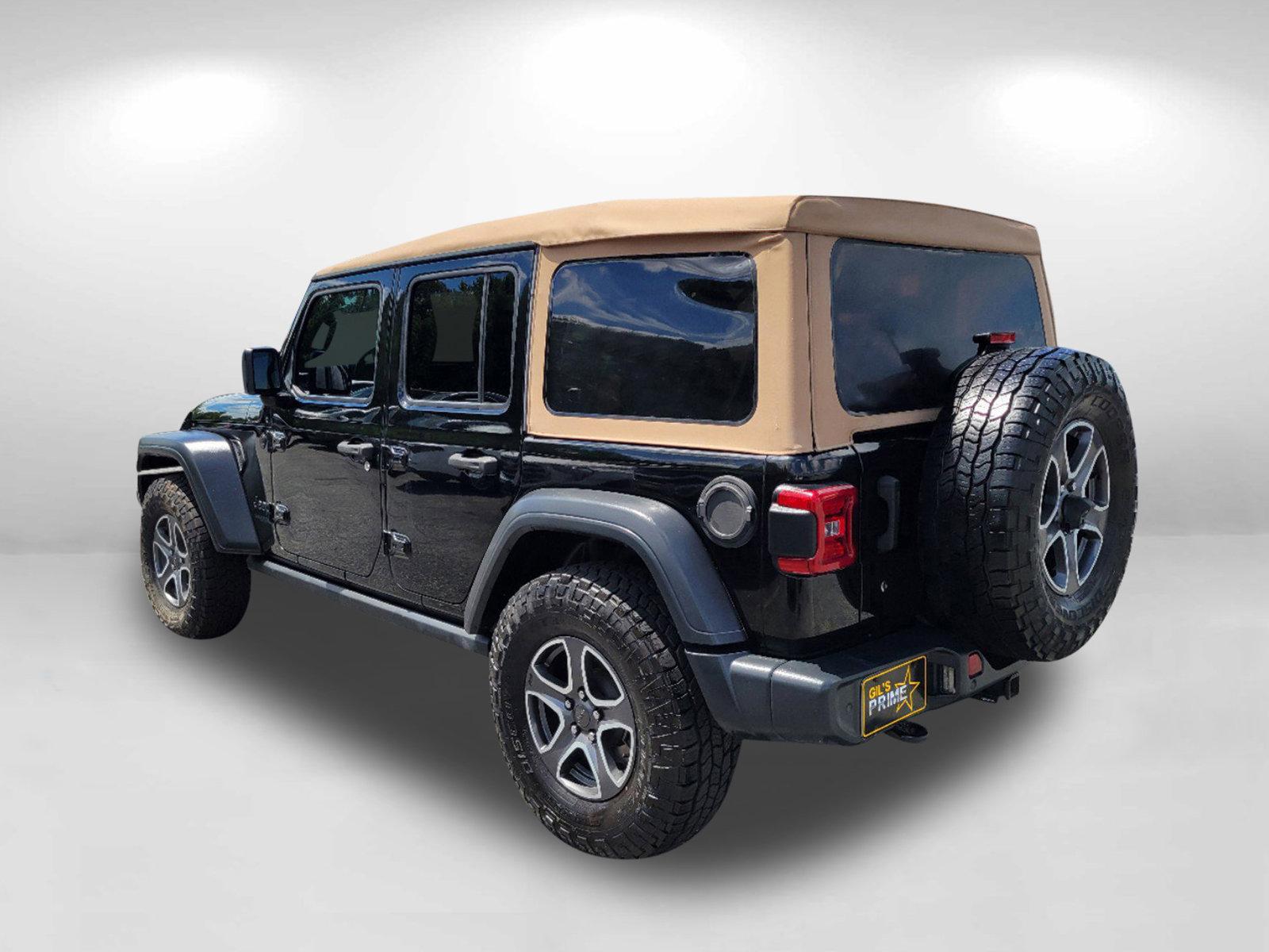 2020 Black Clearcoat /Heritage Tan/Black Jeep Wrangler Unlimited Black and Tan (1C4HJXDG9LW) with an Regular Unleaded V-6 3.6 L/220 engine, 8-Speed Automatic w/OD transmission, located at 1430 Gateway Drive, Opelika, AL, 36801, (334) 239-0944, 32.637871, -85.409790 - 2020 Jeep Wrangler Unlimited Black and Tan - Photo#6