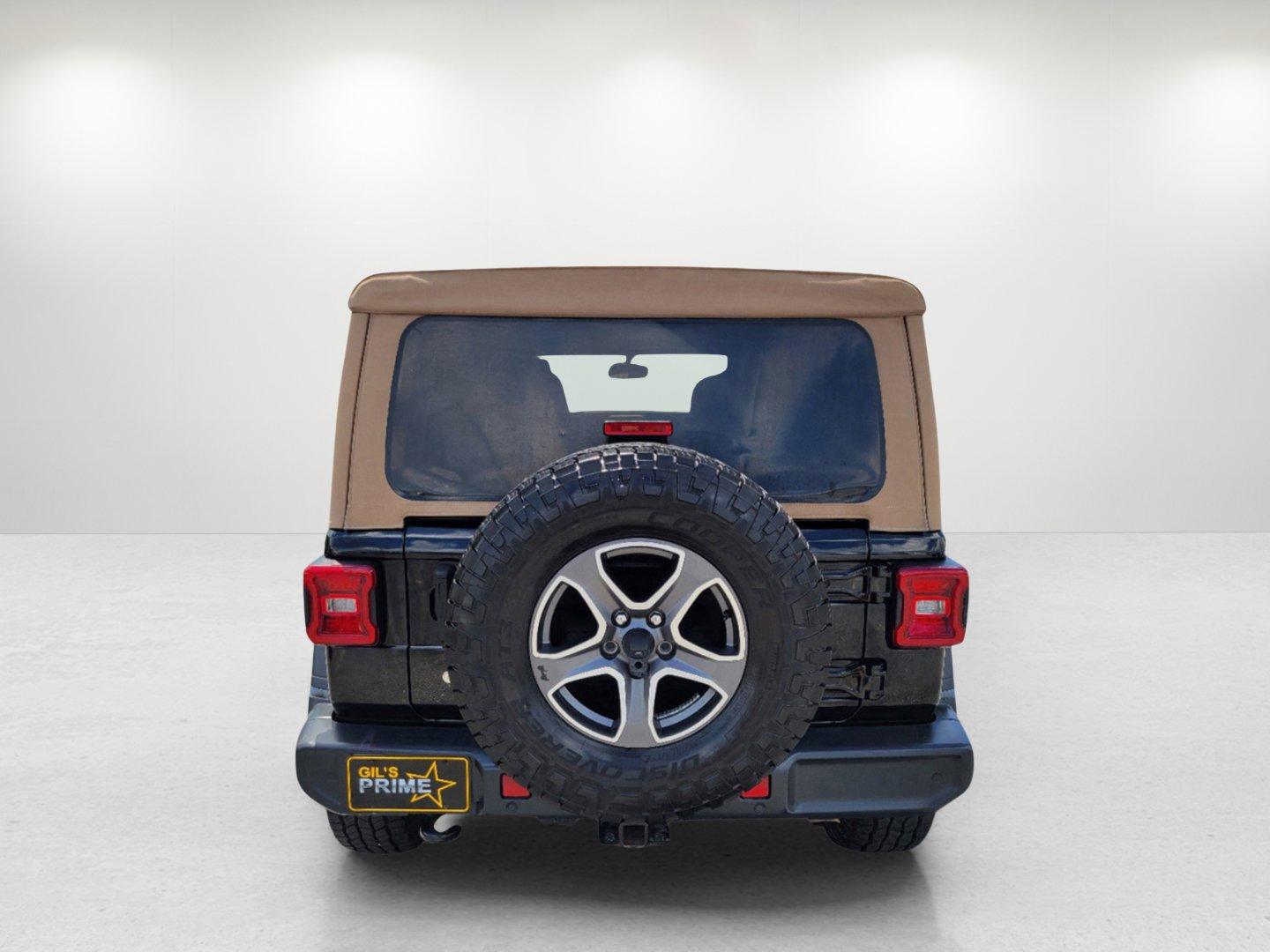 2020 Black Clearcoat /Heritage Tan/Black Jeep Wrangler Unlimited Black and Tan (1C4HJXDG9LW) with an Regular Unleaded V-6 3.6 L/220 engine, 8-Speed Automatic w/OD transmission, located at 804 22nd Ave, Phenix City, AL, 36870, (334) 297-1860, 32.484749, -85.024475 - 2020 Jeep Wrangler Unlimited Black and Tan - Photo#5