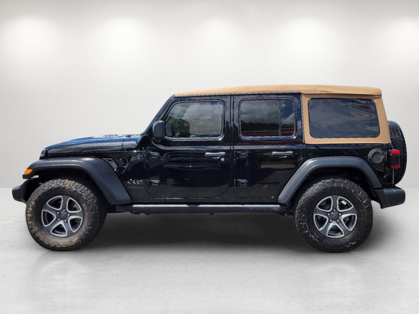 2020 Black Clearcoat /Heritage Tan/Black Jeep Wrangler Unlimited Black and Tan (1C4HJXDG9LW) with an Regular Unleaded V-6 3.6 L/220 engine, 8-Speed Automatic w/OD transmission, located at 804 22nd Ave, Phenix City, AL, 36870, (334) 297-1860, 32.484749, -85.024475 - 2020 Jeep Wrangler Unlimited Black and Tan - Photo#7