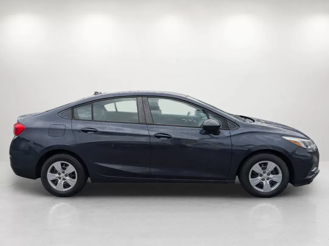 2016 /Jet Black Chevrolet Cruze LS (1G1BC5SM0G7) with an Turbocharged Gas I4 1.4L/ engine, 6-Speed Automatic transmission, located at 1430 Gateway Drive, Opelika, AL, 36801, (334) 239-0944, 32.637871, -85.409790 - 2016 Chevrolet Cruze LS - Photo#4