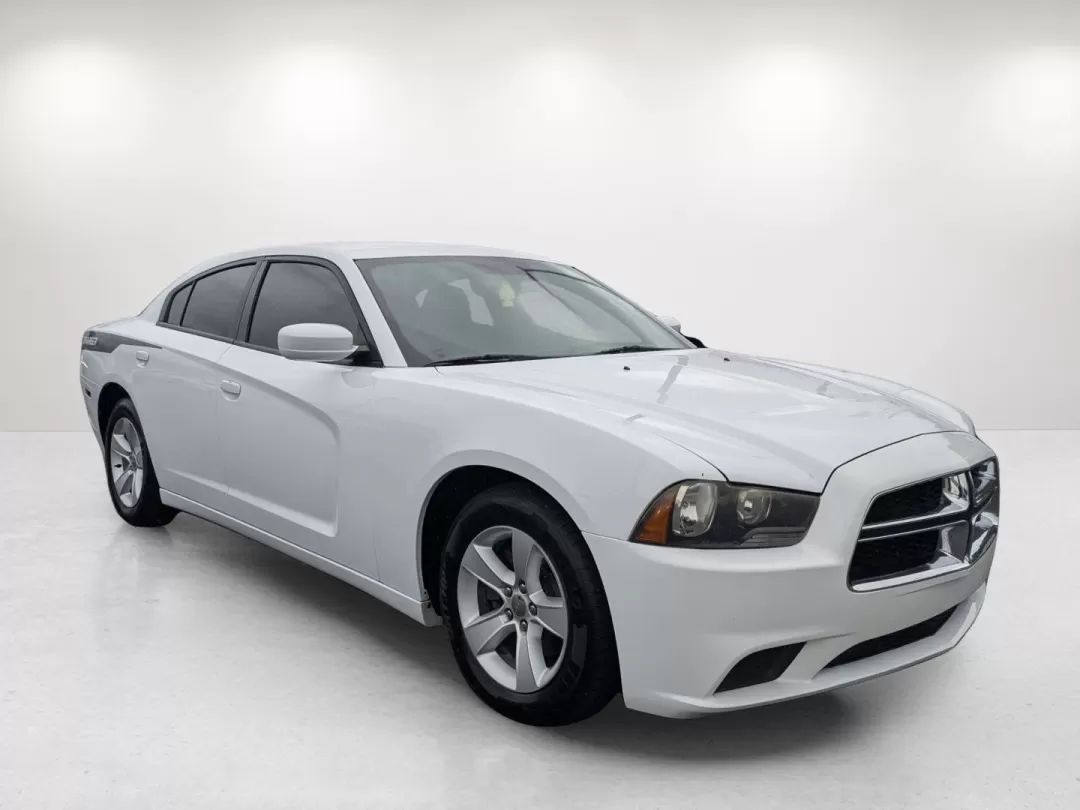 2012 /Black/Light Frost Beige Interior Dodge Charger SE (2C3CDXBG6CH) with an Other engine, located at 3959 U.S. 80 W, Phenix City, AL, 36870, (334) 297-4885, 32.469296, -85.135185 - **Discover Your Next Adventure with the 2012 Dodge Charger SE at Gils Auto!**<br /> <br /> Are you ready to elevate your driving experience? Whether you're a daily commuter navigating the streets of Phenix City or a family seeking a reliable vehicle for weekend getaways, the 2012 Dodge Charger SE is - Photo#2