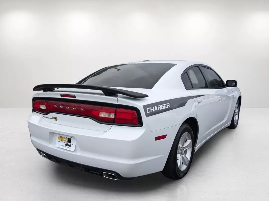 2012 /Black/Light Frost Beige Interior Dodge Charger SE (2C3CDXBG6CH) with an Other engine, located at 3959 U.S. 80 W, Phenix City, AL, 36870, (334) 297-4885, 32.469296, -85.135185 - **Discover Your Next Adventure with the 2012 Dodge Charger SE at Gils Auto!**<br /> <br /> Are you ready to elevate your driving experience? Whether you're a daily commuter navigating the streets of Phenix City or a family seeking a reliable vehicle for weekend getaways, the 2012 Dodge Charger SE is - Photo#4
