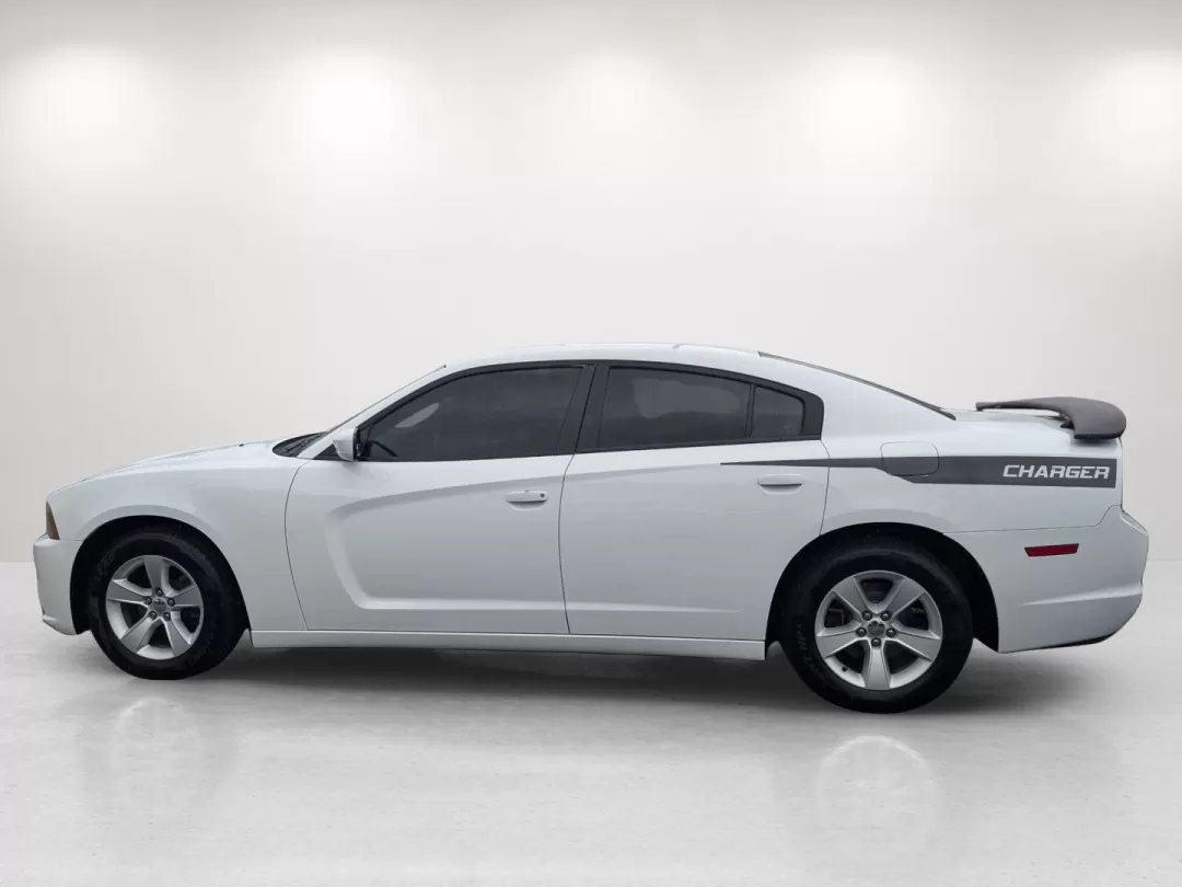 2012 /Black/Light Frost Beige Interior Dodge Charger SE (2C3CDXBG6CH) with an Other engine, located at 3959 U.S. 80 W, Phenix City, AL, 36870, (334) 297-4885, 32.469296, -85.135185 - **Discover Your Next Adventure with the 2012 Dodge Charger SE at Gils Auto!**<br /> <br /> Are you ready to elevate your driving experience? Whether you're a daily commuter navigating the streets of Phenix City or a family seeking a reliable vehicle for weekend getaways, the 2012 Dodge Charger SE is - Photo#7