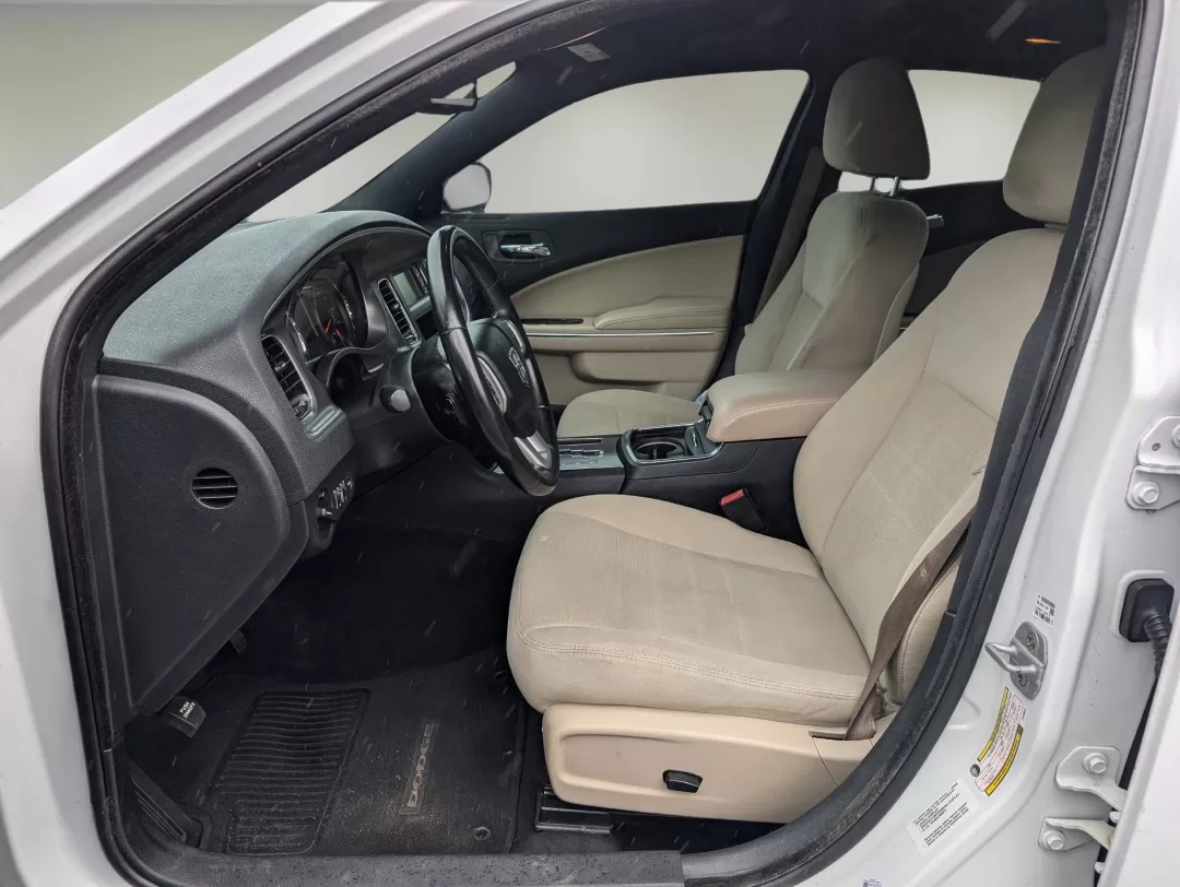 2012 /Black/Light Frost Beige Interior Dodge Charger SE (2C3CDXBG6CH) with an Other engine, located at 3959 U.S. 80 W, Phenix City, AL, 36870, (334) 297-4885, 32.469296, -85.135185 - **Discover Your Next Adventure with the 2012 Dodge Charger SE at Gils Auto!**<br /> <br /> Are you ready to elevate your driving experience? Whether you're a daily commuter navigating the streets of Phenix City or a family seeking a reliable vehicle for weekend getaways, the 2012 Dodge Charger SE is - Photo#9
