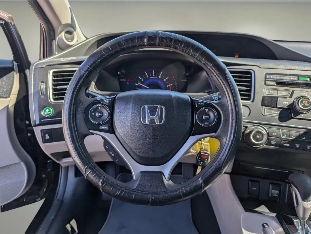 2013 Honda Civic Cpe LX (2HGFG3B57DH) with an Gas I4 1.8L/110 engine, 5-Speed Automatic transmission, located at 1430 Gateway Drive, Opelika, AL, 36801, (334) 239-0944, 32.637871, -85.409790 - 2013 Honda Civic Cpe LX - Photo#15