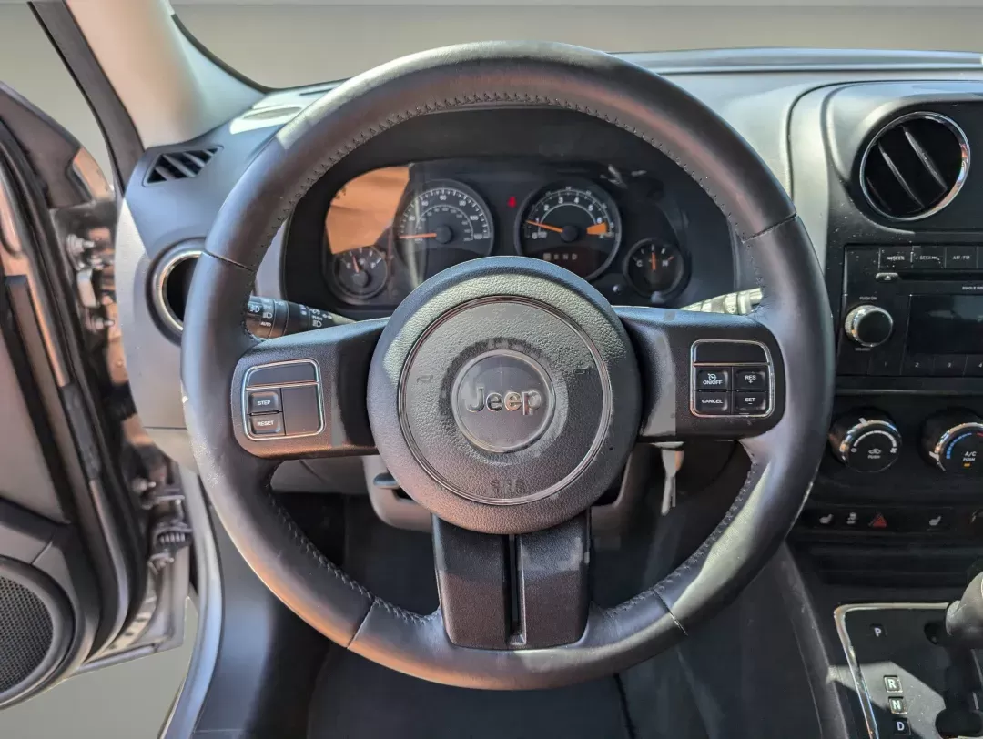 2016 /Dark Slate Gray Jeep Patriot High Altitude Edition (1C4NJPFA9GD) with an Regular Unleaded I-4 2.0 L/122 engine, 1-Speed CVT w/OD transmission, located at 3959 U.S. 80 W, Phenix City, AL, 36870, (334) 297-4885, 32.469296, -85.135185 - 2016 Jeep Patriot High Altitude Edition - Photo#16