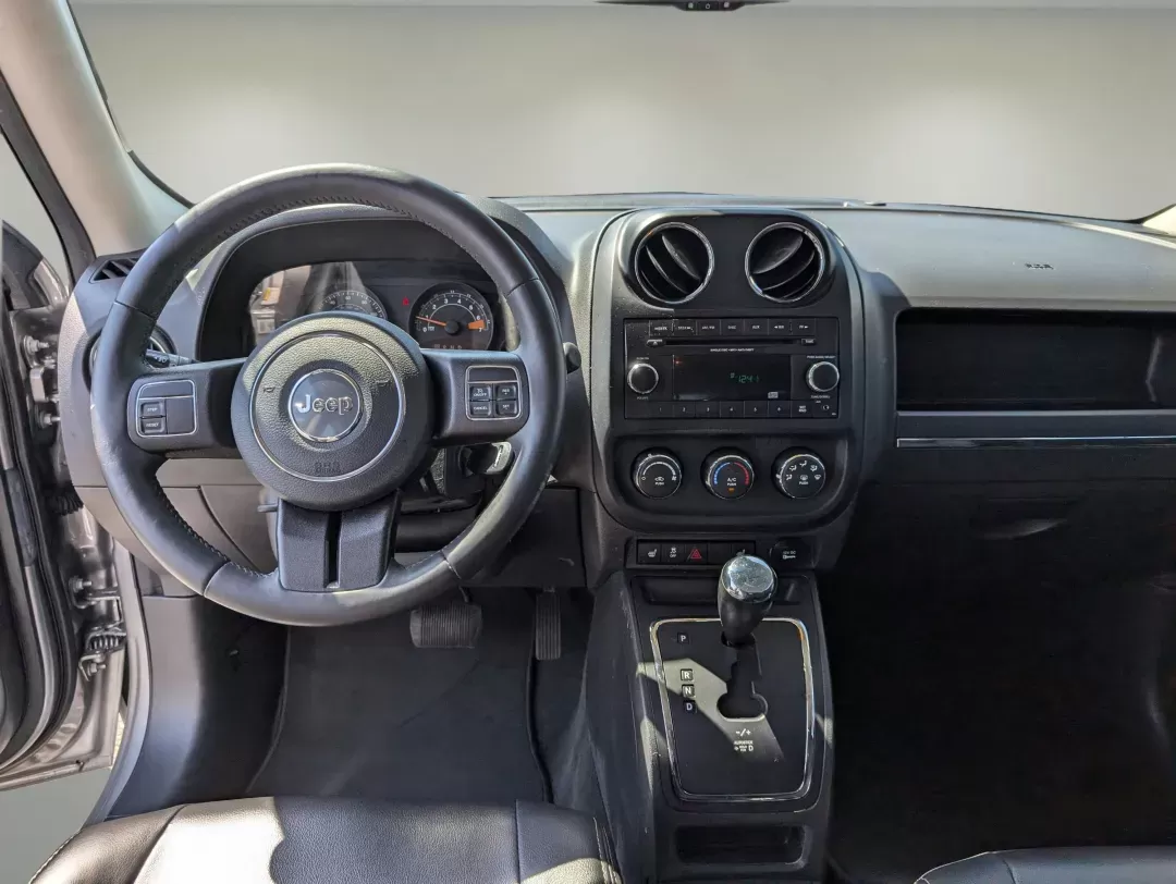 2016 /Dark Slate Gray Jeep Patriot High Altitude Edition (1C4NJPFA9GD) with an Regular Unleaded I-4 2.0 L/122 engine, 1-Speed CVT w/OD transmission, located at 1430 Gateway Drive, Opelika, AL, 36801, (334) 239-0944, 32.637871, -85.409790 - 2016 Jeep Patriot High Altitude Edition - Photo#12