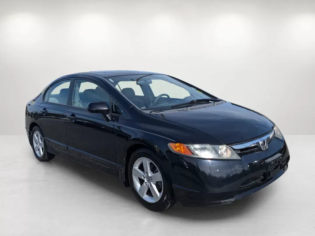 2007 Honda Civic Sdn EX (1HGFA16857L) with an Gas I4 1.8L/110 engine, 5-Speed Automatic transmission, located at 1430 Gateway Drive, Opelika, AL, 36801, (334) 239-0944, 32.637871, -85.409790 - 2007 Honda Civic Sdn EX - Photo#2