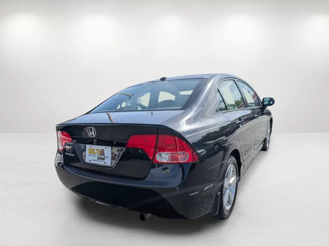 2007 Honda Civic Sdn EX (1HGFA16857L) with an Gas I4 1.8L/110 engine, 5-Speed Automatic transmission, located at 1430 Gateway Drive, Opelika, AL, 36801, (334) 239-0944, 32.637871, -85.409790 - 2007 Honda Civic Sdn EX - Photo#4