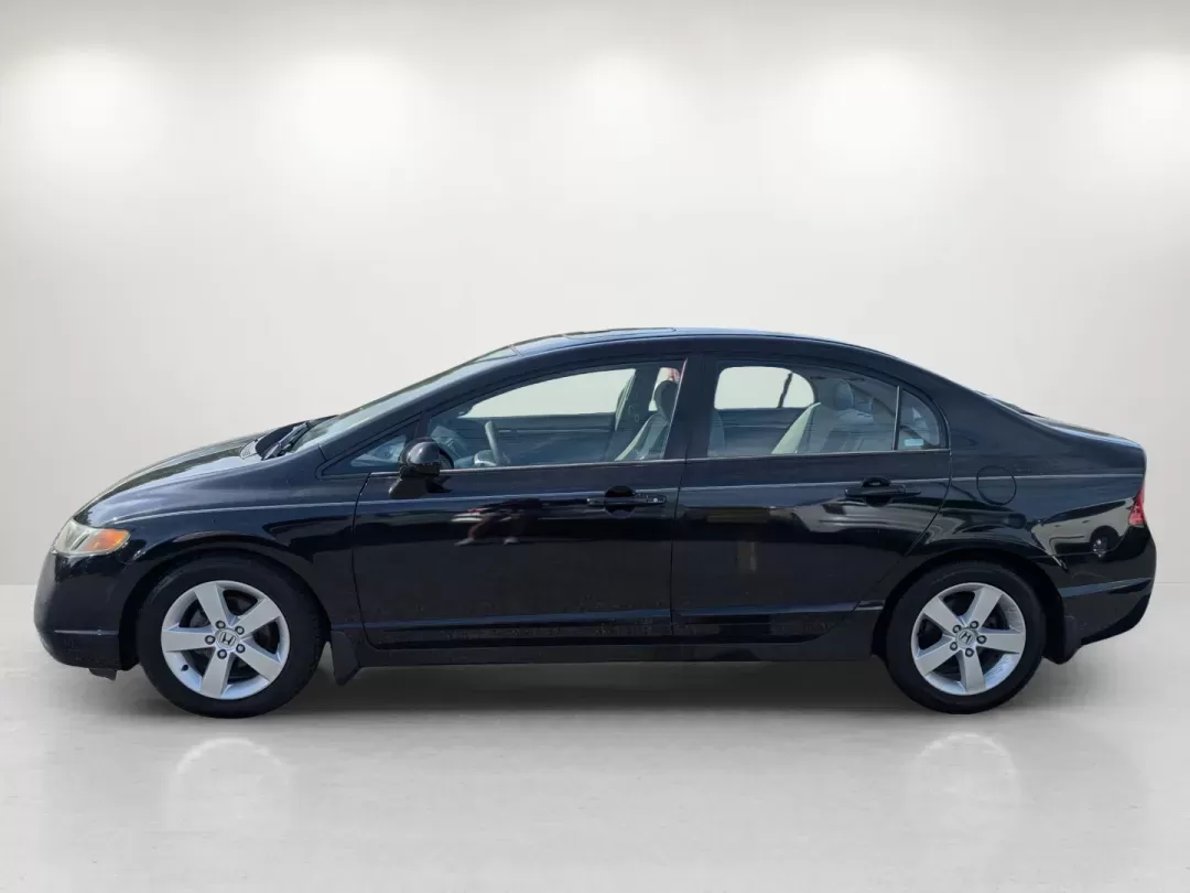 2007 Honda Civic Sdn EX (1HGFA16857L) with an Gas I4 1.8L/110 engine, 5-Speed Automatic transmission, located at 1430 Gateway Drive, Opelika, AL, 36801, (334) 239-0944, 32.637871, -85.409790 - 2007 Honda Civic Sdn EX - Photo#7