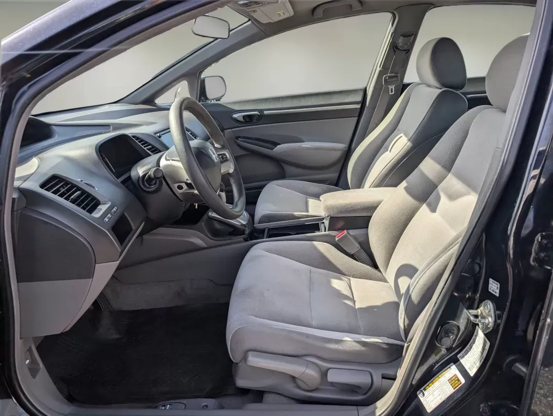 2007 Honda Civic Sdn EX (1HGFA16857L) with an Gas I4 1.8L/110 engine, 5-Speed Automatic transmission, located at 1430 Gateway Drive, Opelika, AL, 36801, (334) 239-0944, 32.637871, -85.409790 - 2007 Honda Civic Sdn EX - Photo#9