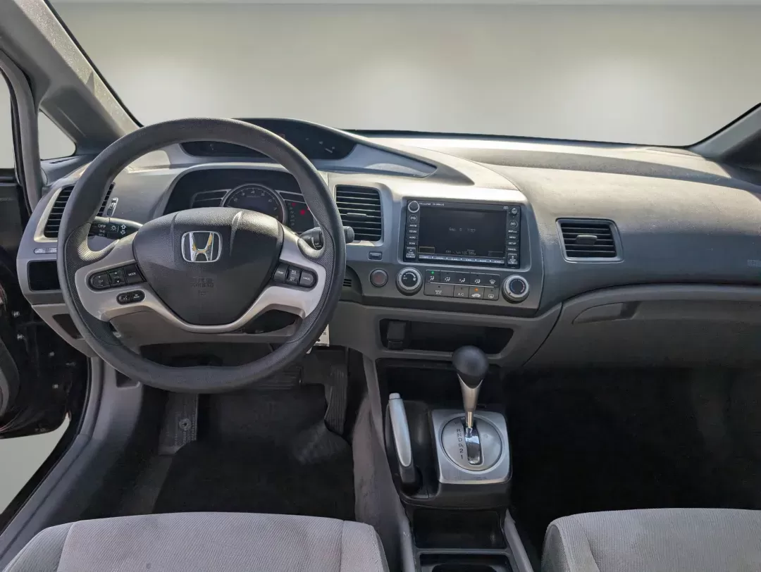 2007 Honda Civic Sdn EX (1HGFA16857L) with an Gas I4 1.8L/110 engine, 5-Speed Automatic transmission, located at 1430 Gateway Drive, Opelika, AL, 36801, (334) 239-0944, 32.637871, -85.409790 - 2007 Honda Civic Sdn EX - Photo#11