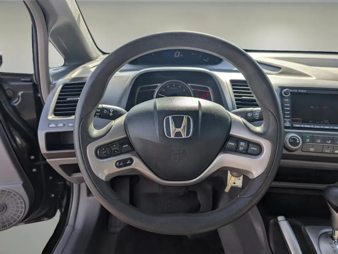 2007 Honda Civic Sdn EX (1HGFA16857L) with an Gas I4 1.8L/110 engine, 5-Speed Automatic transmission, located at 1430 Gateway Drive, Opelika, AL, 36801, (334) 239-0944, 32.637871, -85.409790 - 2007 Honda Civic Sdn EX - Photo#15