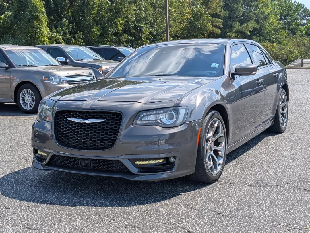 2018 /Black Chrysler 300 300S (2C3CCABGXJH) with an Other engine, located at 3959 U.S. 80 W, Phenix City, AL, 36870, (334) 297-4885, 32.469296, -85.135185 - Looking for a vehicle that combines luxury with performance? Experience the perfect blend of style and substance with the stunning 2018 Chrysler 300S, available now at Gils Auto in Phenix City, AL. This sleek sedan is not just a car; it's an extension of your lifestyle-ideal for those who crave a so - Photo#1