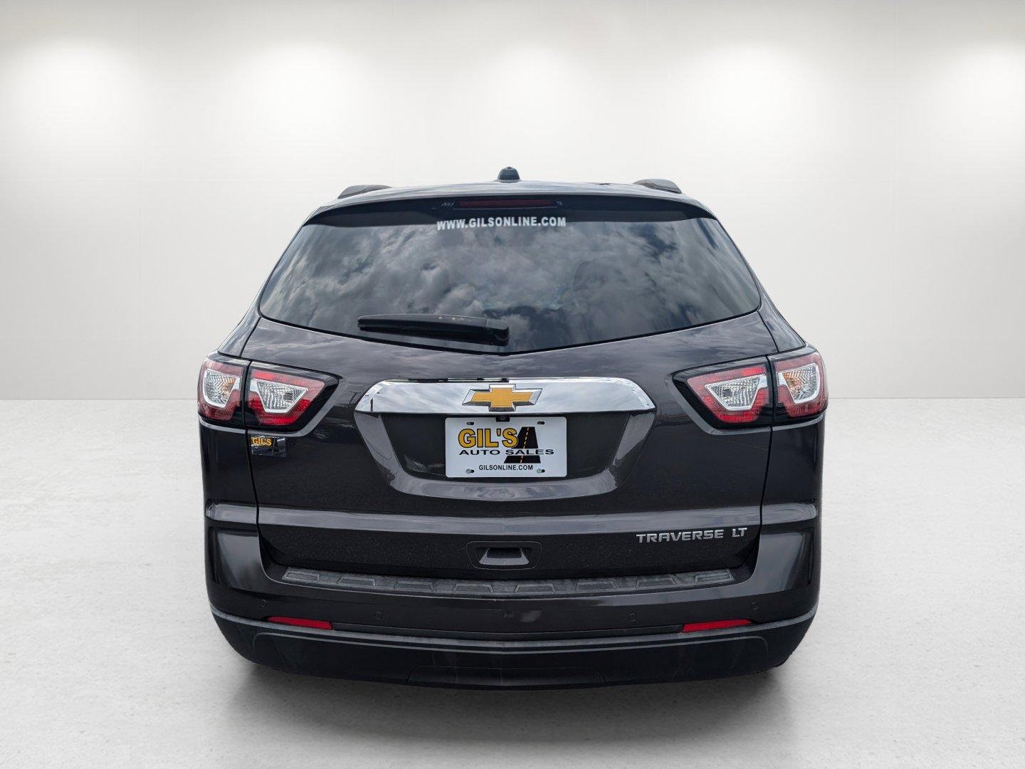 2016 /Ebony Chevrolet Traverse LT (1GNKRGKD7GJ) with an Gas V6 3.6L/217 engine, 6-Speed Automatic transmission, located at 7000 Northlake Connector, Columbus, GA, 31904, (706) 987-8085, 32.524975, -84.978134 - 2016 Chevrolet Traverse LT - Photo#5