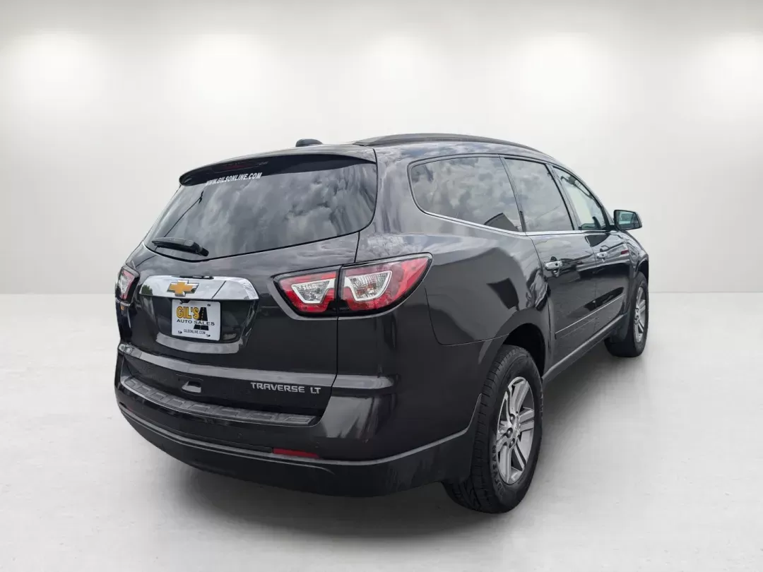 2016 /Ebony Chevrolet Traverse LT (1GNKRGKD7GJ) with an Gas V6 3.6L/217 engine, 6-Speed Automatic transmission, located at 7000 Northlake Connector, Columbus, GA, 31904, (706) 987-8085, 32.524975, -84.978134 - 2016 Chevrolet Traverse LT - Photo#4