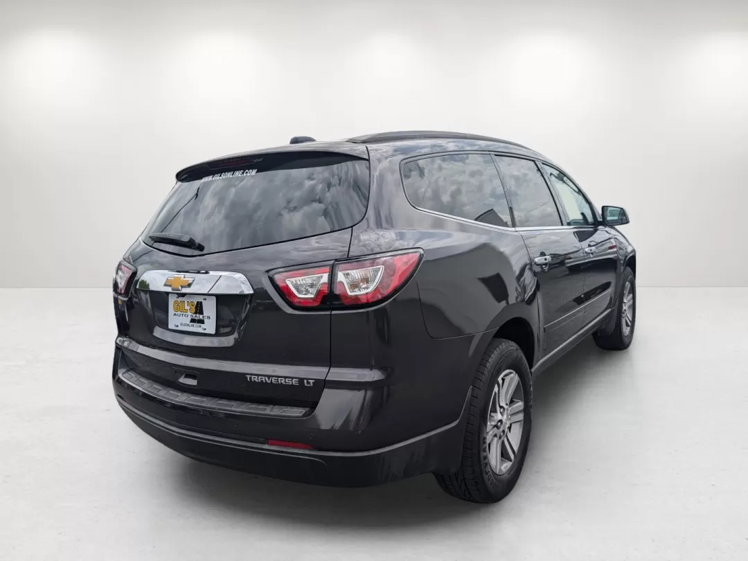 2016 /Ebony Chevrolet Traverse LT (1GNKRGKD7GJ) with an Other engine, located at 3959 U.S. 80 W, Phenix City, AL, 36870, (334) 297-4885, 32.469296, -85.135185 - 2016 Chevrolet Traverse LT - Photo#4
