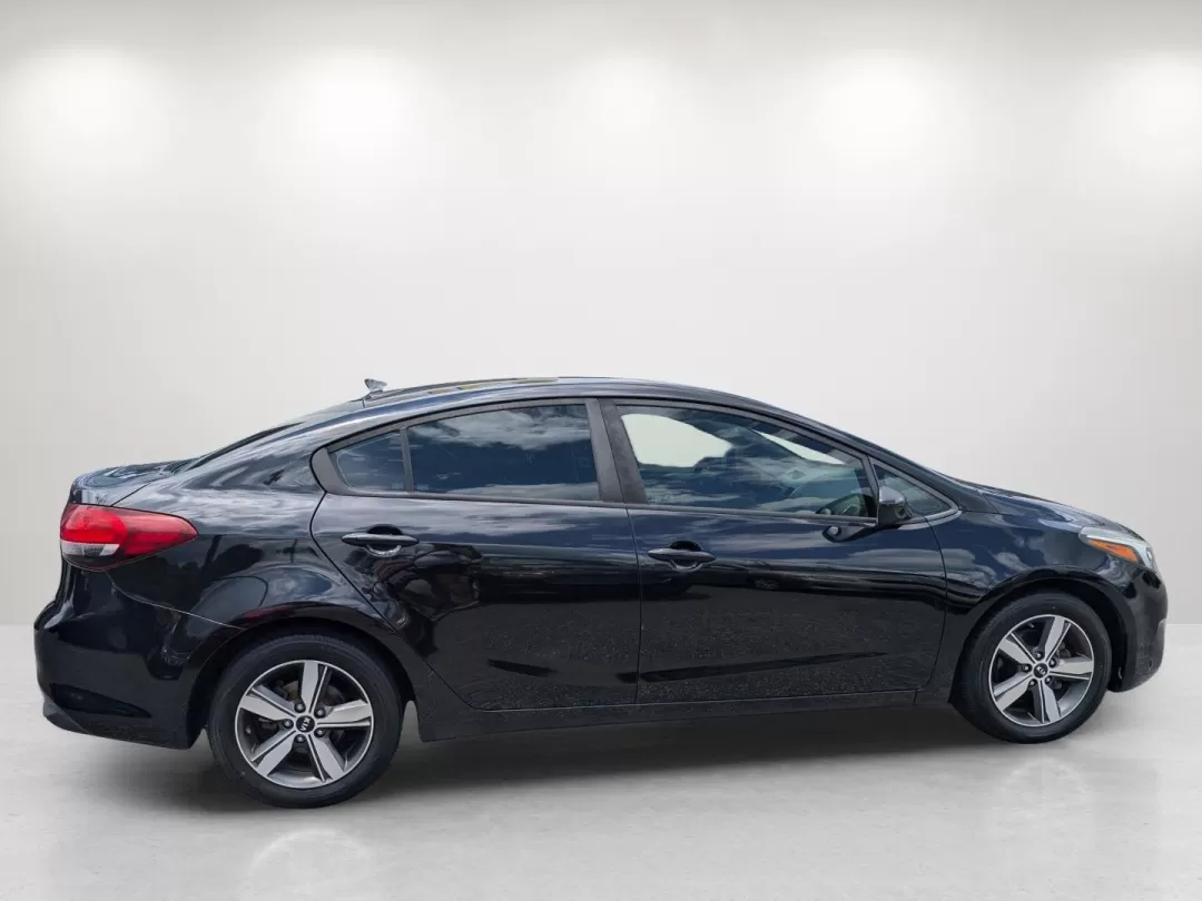 2018 /Black Kia Forte LX (3KPFL4A75JE) with an Other engine, located at 3959 U.S. 80 W, Phenix City, AL, 36870, (334) 297-4885, 32.469296, -85.135185 - **Discover Freedom and Comfort with the 2018 Kia Forte at Gils Auto Phenix City #2!**<br /> <br /> Are you searching for a reliable vehicle that balances style, comfort, and efficiency? Look no further than our stunning 2018 Kia Forte, perfect for those daily commutes or weekend adventures with fam - Photo#4