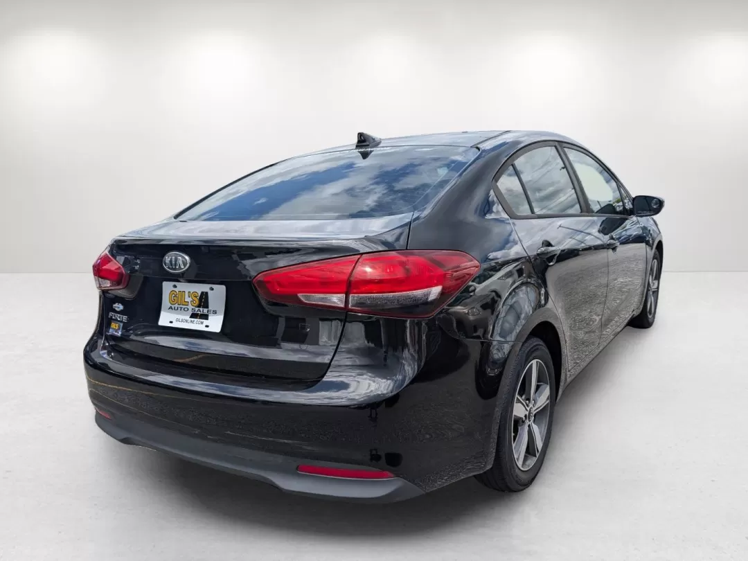 2018 /Black Kia Forte LX (3KPFL4A75JE) with an Other engine, located at 3959 U.S. 80 W, Phenix City, AL, 36870, (334) 297-4885, 32.469296, -85.135185 - **Discover Freedom and Comfort with the 2018 Kia Forte at Gils Auto Phenix City #2!**<br /> <br /> Are you searching for a reliable vehicle that balances style, comfort, and efficiency? Look no further than our stunning 2018 Kia Forte, perfect for those daily commutes or weekend adventures with fam - Photo#5