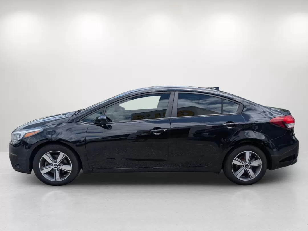 2018 /Black Kia Forte LX (3KPFL4A75JE) with an Other engine, located at 3959 U.S. 80 W, Phenix City, AL, 36870, (334) 297-4885, 32.469296, -85.135185 - **Discover Freedom and Comfort with the 2018 Kia Forte at Gils Auto Phenix City #2!**<br /> <br /> Are you searching for a reliable vehicle that balances style, comfort, and efficiency? Look no further than our stunning 2018 Kia Forte, perfect for those daily commutes or weekend adventures with fam - Photo#8