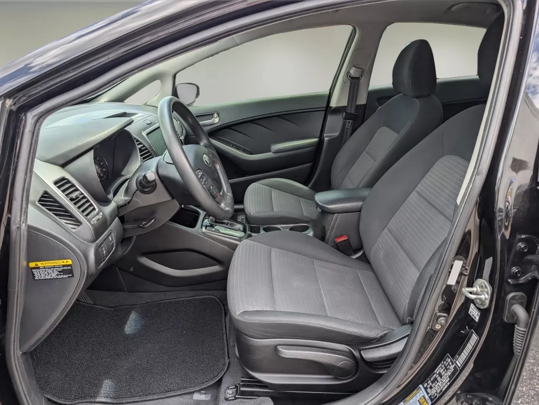 2018 /Black Kia Forte LX (3KPFL4A75JE) with an Other engine, located at 3959 U.S. 80 W, Phenix City, AL, 36870, (334) 297-4885, 32.469296, -85.135185 - **Discover Freedom and Comfort with the 2018 Kia Forte at Gils Auto Phenix City #2!**<br /> <br /> Are you searching for a reliable vehicle that balances style, comfort, and efficiency? Look no further than our stunning 2018 Kia Forte, perfect for those daily commutes or weekend adventures with fam - Photo#10