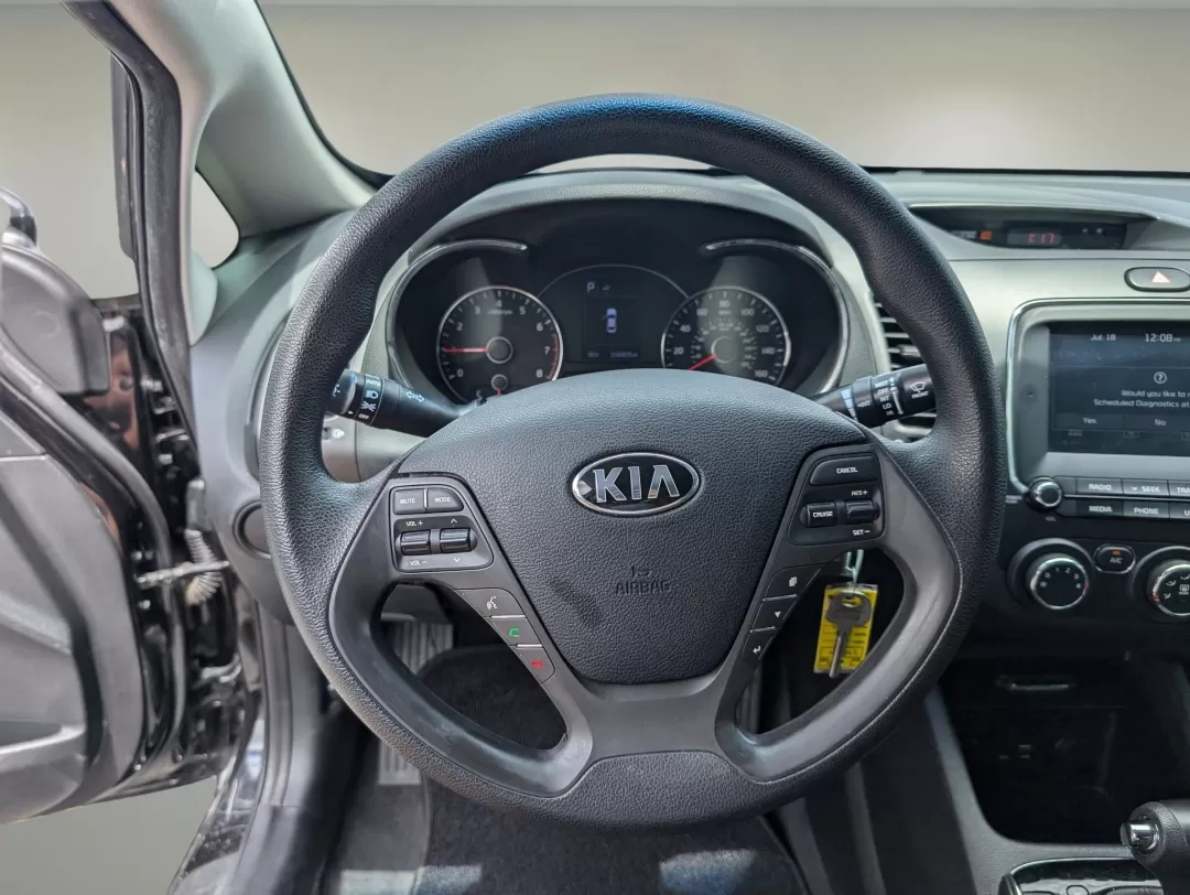 2018 /Black Kia Forte LX (3KPFL4A75JE) with an Other engine, located at 3959 U.S. 80 W, Phenix City, AL, 36870, (334) 297-4885, 32.469296, -85.135185 - **Discover Freedom and Comfort with the 2018 Kia Forte at Gils Auto Phenix City #2!**<br /> <br /> Are you searching for a reliable vehicle that balances style, comfort, and efficiency? Look no further than our stunning 2018 Kia Forte, perfect for those daily commutes or weekend adventures with fam - Photo#16