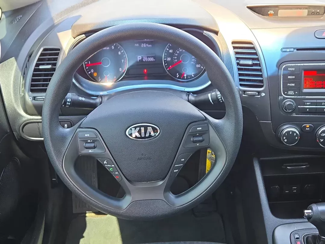 2016 /Black Kia Forte LX (KNAFK4A6XG5) with an Other engine, located at 804 22nd Ave, Phenix City, AL, 36870, (334) 297-1860, 32.484749, -85.024475 - **Drive Your Future with Confidence: 2016 Kia Forte at Gils Auto - Phenix City #2!**<br /> <br /> Are you in search of a reliable and stylish vehicle that perfectly suits your daily adventures? Look no further than the 2016 Kia Forte, available now at Gils Auto - Phenix City #2! This sedan is a fant - Photo#16