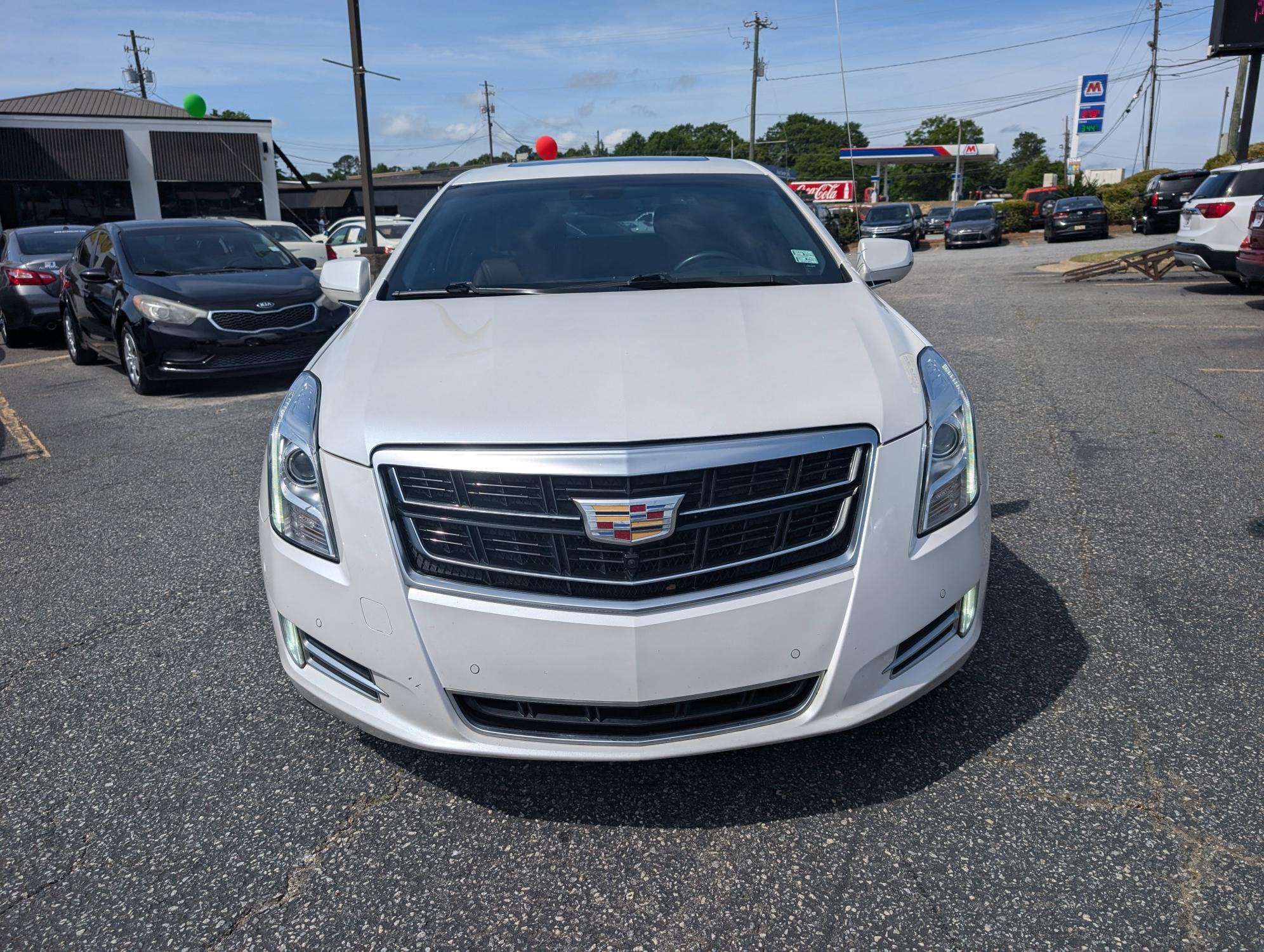 2016 /Kona Brown with Jet Black accents Cadillac XTS Luxury Collection (2G61M5S36G9) with an Gas V6 3.6L/217 engine, 6-Speed Automatic w/Manual Shift transmission, located at 3959 U.S. 80 W, Phenix City, AL, 36870, (334) 297-4885, 32.469296, -85.135185 - 2016 Cadillac XTS Luxury Collection - Photo#1