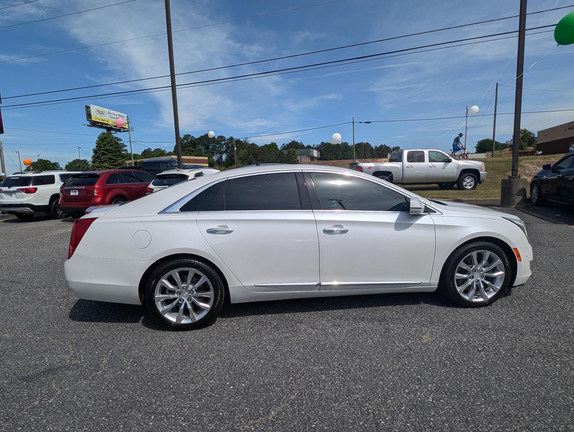 2016 /Kona Brown with Jet Black accents Cadillac XTS Luxury Collection (2G61M5S36G9) with an Gas V6 3.6L/217 engine, 6-Speed Automatic w/Manual Shift transmission, located at 3959 U.S. 80 W, Phenix City, AL, 36870, (334) 297-4885, 32.469296, -85.135185 - 2016 Cadillac XTS Luxury Collection - Photo#3