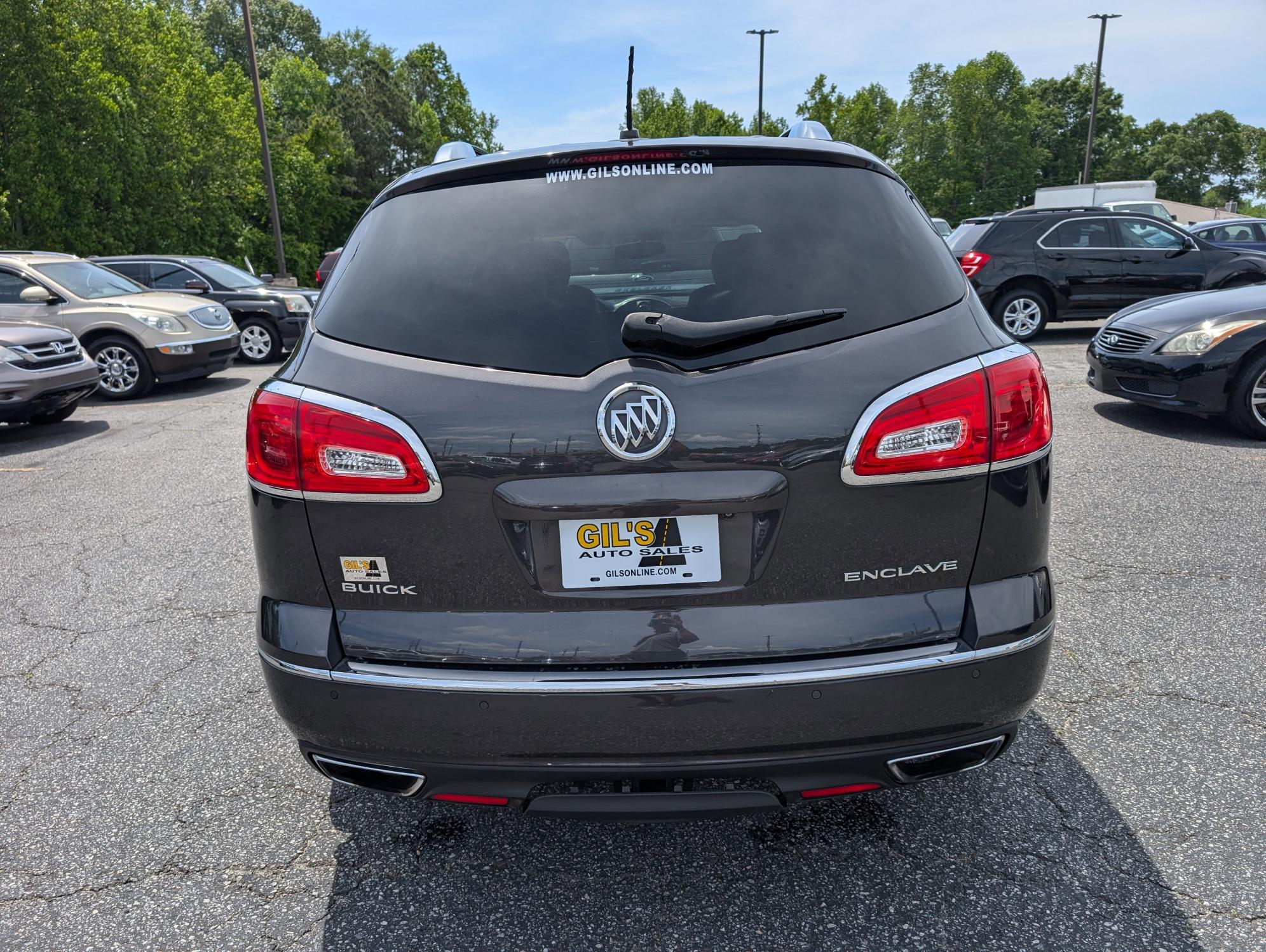 2015 /Ebony Buick Enclave Premium (5GAKRCKD9FJ) with an Gas V6 3.6L/217 engine, 6-Speed Automatic transmission, located at 3959 U.S. 80 W, Phenix City, AL, 36870, (334) 297-4885, 32.469296, -85.135185 - 2015 Buick Enclave Premium - Photo#4