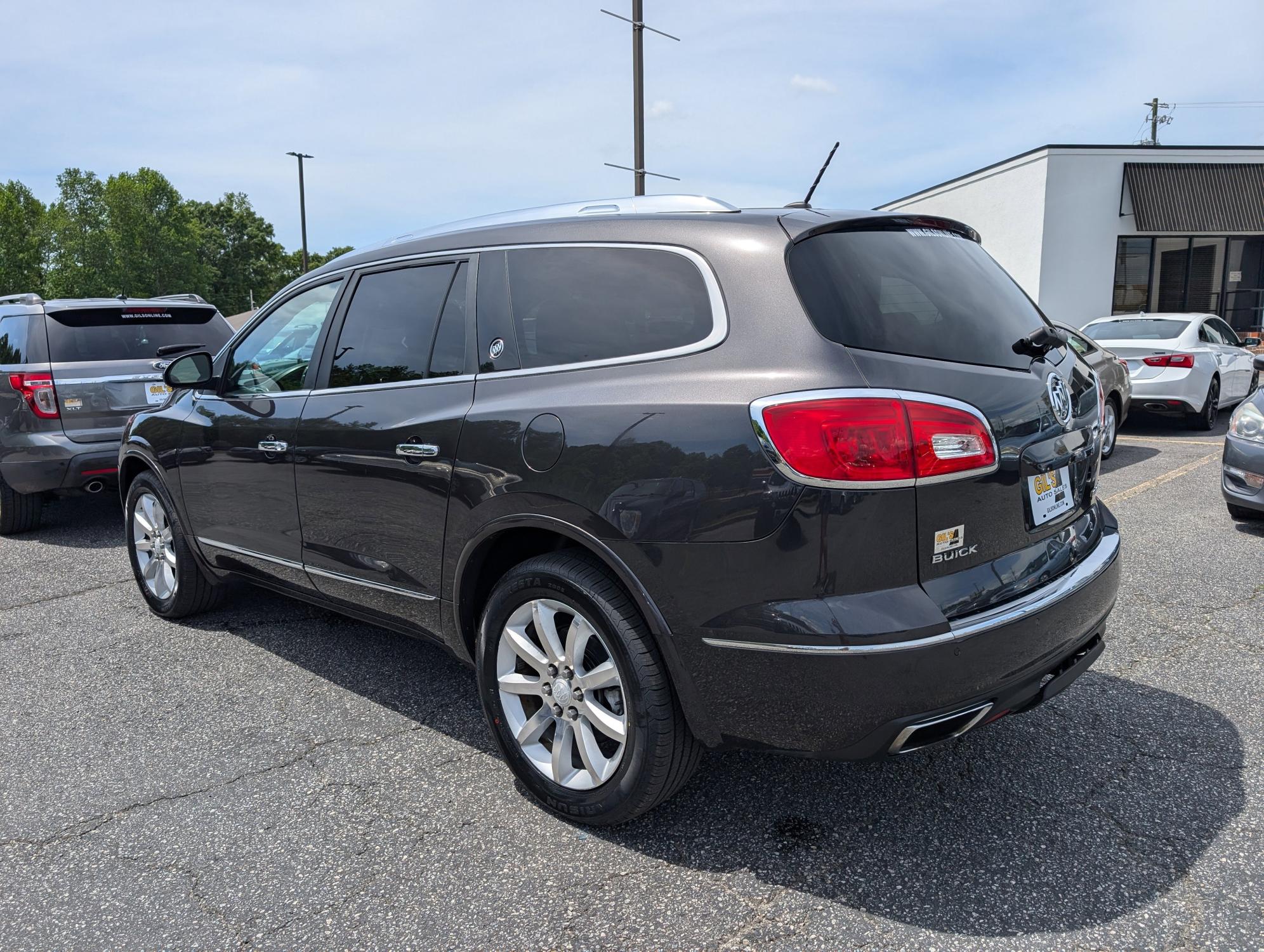 2015 /Ebony Buick Enclave Premium (5GAKRCKD9FJ) with an Gas V6 3.6L/217 engine, 6-Speed Automatic transmission, located at 3959 U.S. 80 W, Phenix City, AL, 36870, (334) 297-4885, 32.469296, -85.135185 - 2015 Buick Enclave Premium - Photo#5