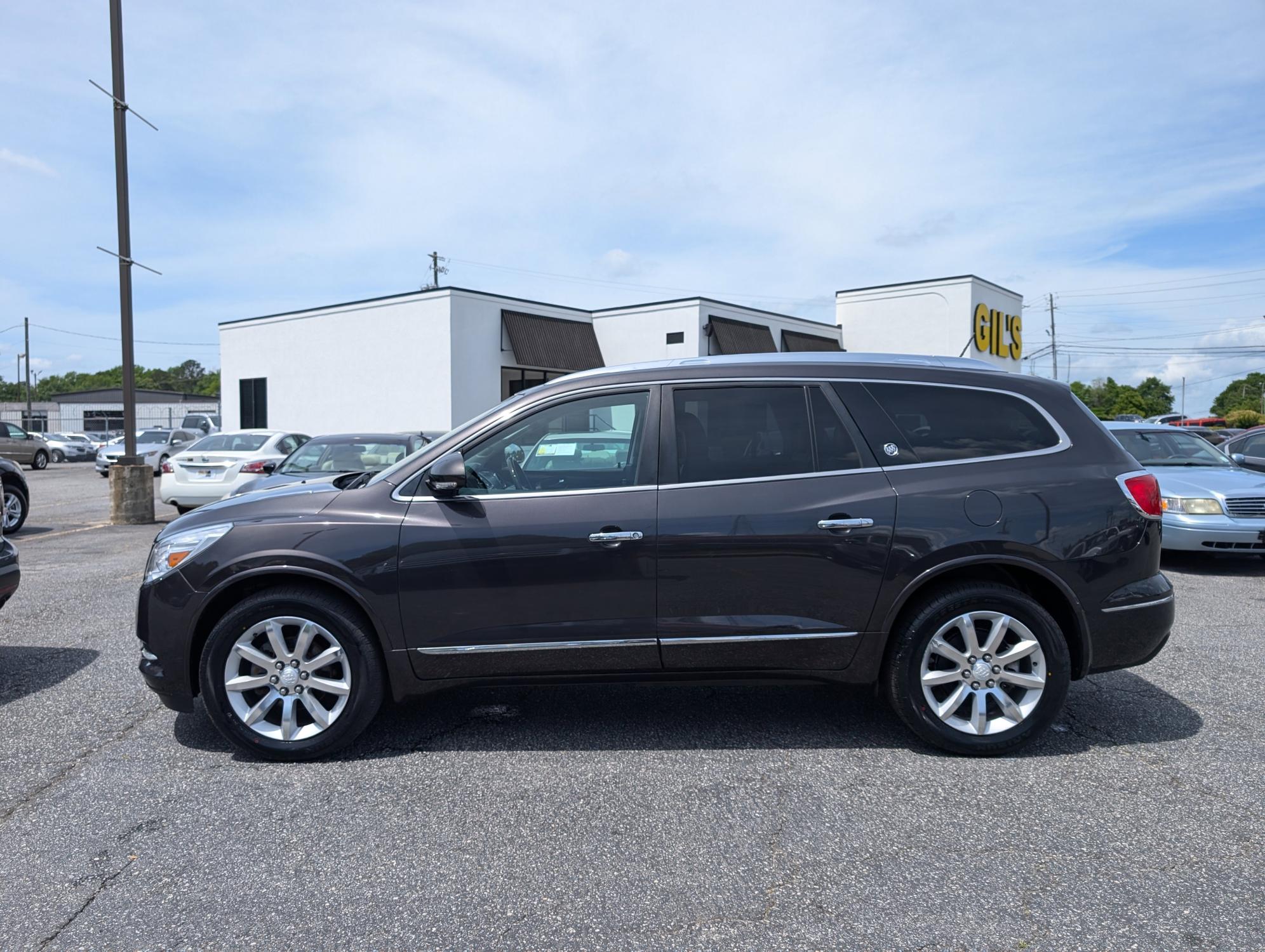 2015 /Ebony Buick Enclave Premium (5GAKRCKD9FJ) with an Gas V6 3.6L/217 engine, 6-Speed Automatic transmission, located at 3959 U.S. 80 W, Phenix City, AL, 36870, (334) 297-4885, 32.469296, -85.135185 - 2015 Buick Enclave Premium - Photo#6