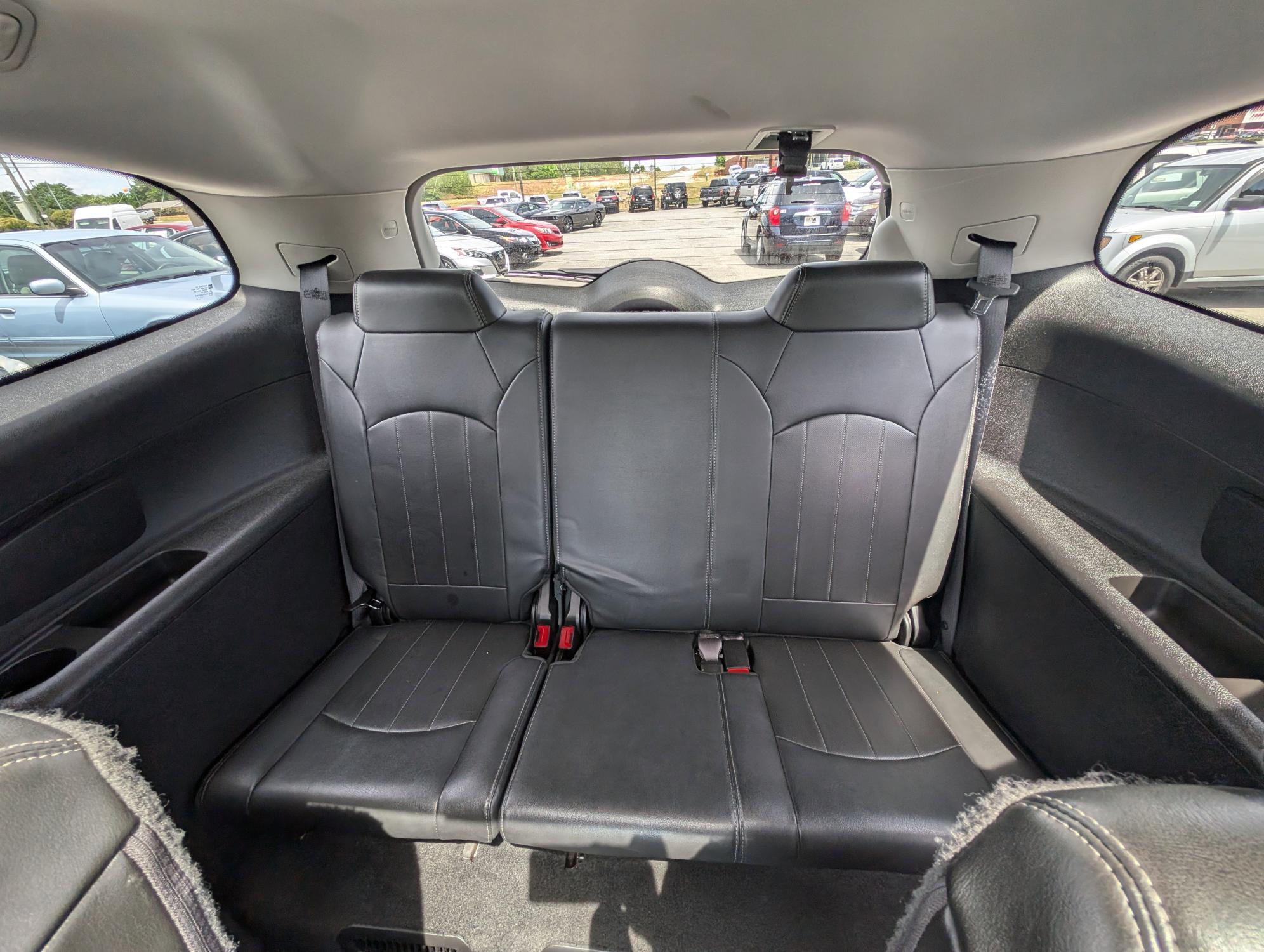 2015 /Ebony Buick Enclave Premium (5GAKRCKD9FJ) with an Gas V6 3.6L/217 engine, 6-Speed Automatic transmission, located at 3959 U.S. 80 W, Phenix City, AL, 36870, (334) 297-4885, 32.469296, -85.135185 - 2015 Buick Enclave Premium - Photo#10
