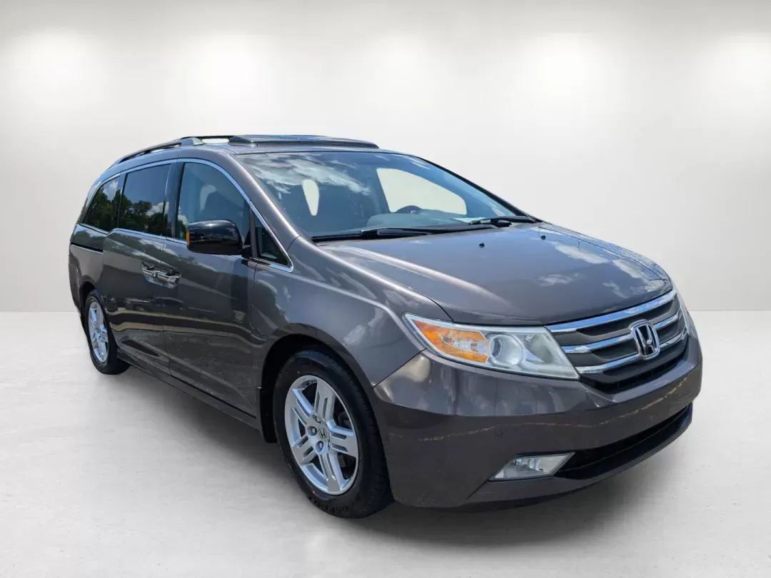2012 Honda Odyssey Touring (5FNRL5H92CB) with an Gas V6 3.5L/212 engine, 6-Speed Automatic transmission, located at 3959 U.S. 80 W, Phenix City, AL, 36870, (334) 297-4885, 32.469296, -85.135185 - 2012 Honda Odyssey Touring - Photo#2