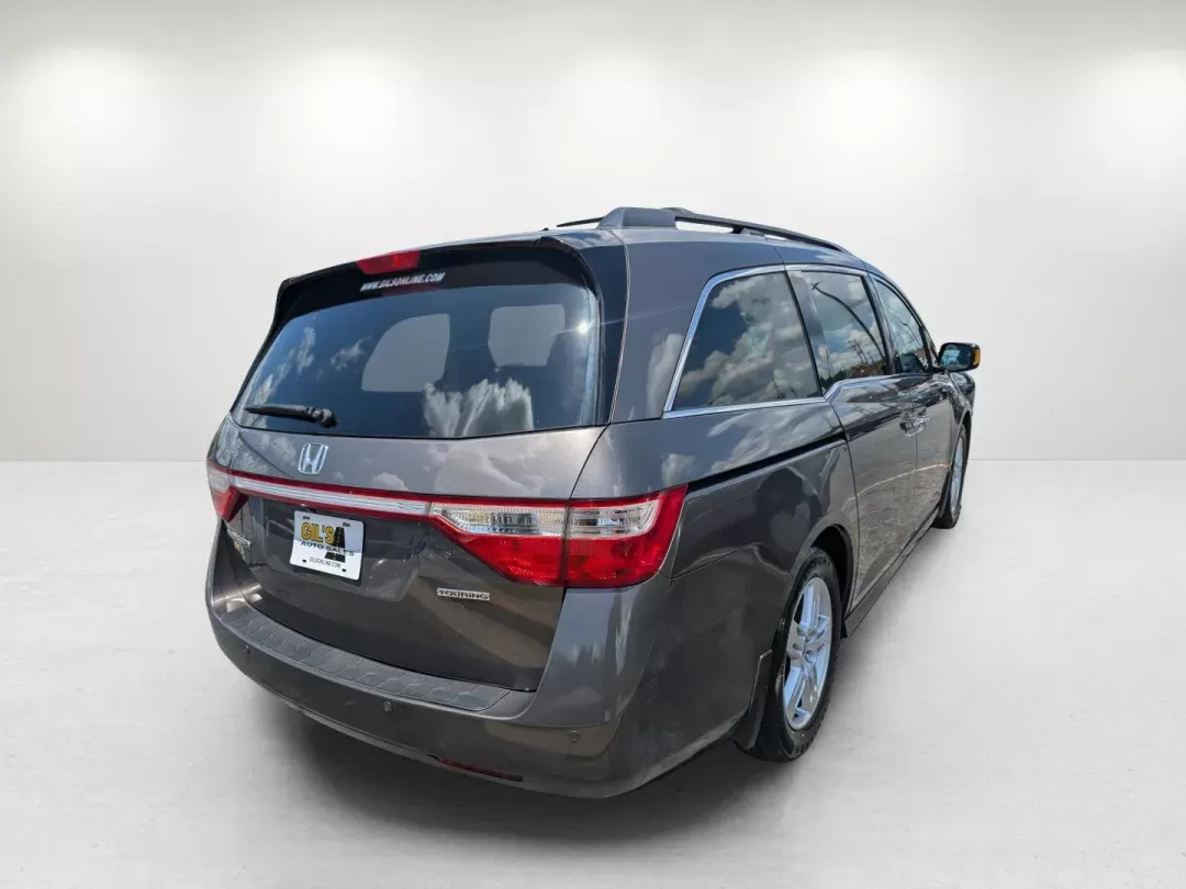 2012 Honda Odyssey Touring (5FNRL5H92CB) with an Gas V6 3.5L/212 engine, 6-Speed Automatic transmission, located at 3959 U.S. 80 W, Phenix City, AL, 36870, (334) 297-4885, 32.469296, -85.135185 - 2012 Honda Odyssey Touring - Photo#4