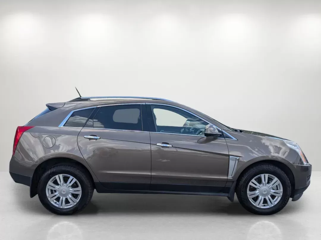 2015 /Shale w/Brownstone accents Cadillac SRX Luxury Collection (3GYFNBE33FS) with an Gas V6 3.6L/217 engine, 6-Speed Automatic w/Manual Shift transmission, located at 7000 Northlake Connector, Columbus, GA, 31904, (706) 987-8085, 32.524975, -84.978134 - 2015 Cadillac SRX Luxury Collection - Photo#2