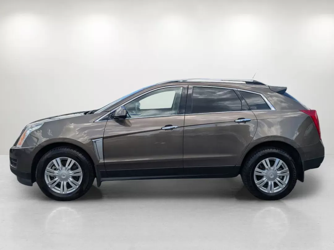 2015 /Shale w/Brownstone accents Cadillac SRX Luxury Collection (3GYFNBE33FS) with an Gas V6 3.6L/217 engine, 6-Speed Automatic w/Manual Shift transmission, located at 7000 Northlake Connector, Columbus, GA, 31904, (706) 987-8085, 32.524975, -84.978134 - 2015 Cadillac SRX Luxury Collection - Photo#6