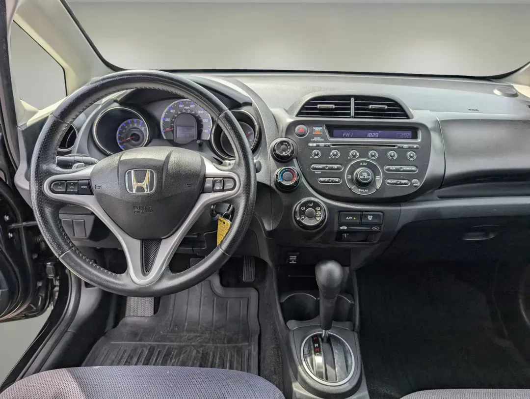 2012 Honda Fit Sport (JHMGE8H57CC) with an Gas I4 1.5L/91 engine, 5-Speed Automatic transmission, located at 7000 Northlake Connector, Columbus, GA, 31904, (706) 987-8085, 32.524975, -84.978134 - 2012 Honda Fit Sport - Photo#11