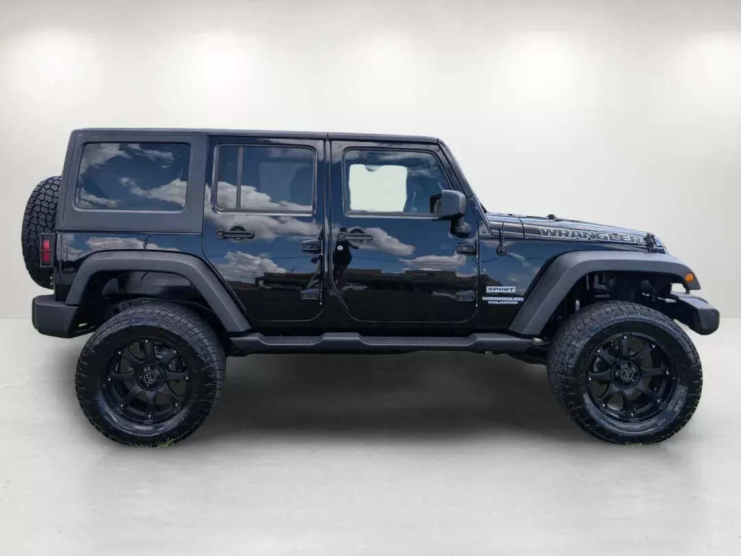 2015 /Black Jeep Wrangler Unlimited Sport (1C4BJWDG2FL) with an Regular Unleaded V-6 3.6 L/220 engine, 5-Speed Automatic w/OD transmission, located at 3959 U.S. 80 W, Phenix City, AL, 36870, (334) 297-4885, 32.469296, -85.135185 - 2015 Jeep Wrangler Unlimited Sport - Photo#4
