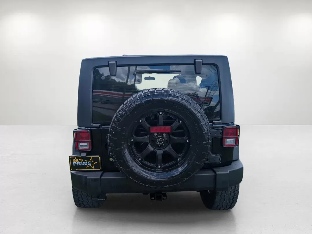 2015 /Black Jeep Wrangler Unlimited Sport (1C4BJWDG2FL) with an Regular Unleaded V-6 3.6 L/220 engine, 5-Speed Automatic w/OD transmission, located at 3959 U.S. 80 W, Phenix City, AL, 36870, (334) 297-4885, 32.469296, -85.135185 - 2015 Jeep Wrangler Unlimited Sport - Photo#6