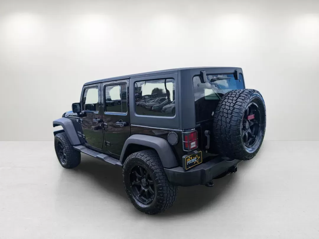 2015 /Black Jeep Wrangler Unlimited Sport (1C4BJWDG2FL) with an Regular Unleaded V-6 3.6 L/220 engine, 5-Speed Automatic w/OD transmission, located at 3959 U.S. 80 W, Phenix City, AL, 36870, (334) 297-4885, 32.469296, -85.135185 - 2015 Jeep Wrangler Unlimited Sport - Photo#7