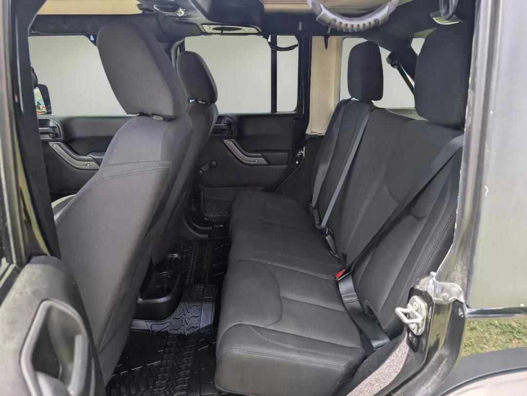 2015 /Black Jeep Wrangler Unlimited Sport (1C4BJWDG2FL) with an Regular Unleaded V-6 3.6 L/220 engine, 5-Speed Automatic w/OD transmission, located at 3959 U.S. 80 W, Phenix City, AL, 36870, (334) 297-4885, 32.469296, -85.135185 - 2015 Jeep Wrangler Unlimited Sport - Photo#11