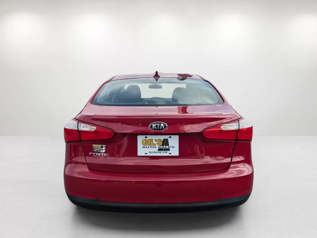 2016 /Black Kia Forte LX (KNAFK4A61G5) with an Regular Unleaded I-4 1.8 L/110 engine, 6-Speed Manual w/OD transmission, located at 1430 Gateway Drive, Opelika, AL, 36801, (334) 239-0944, 32.637871, -85.409790 - 2016 Kia Forte LX - Photo#4