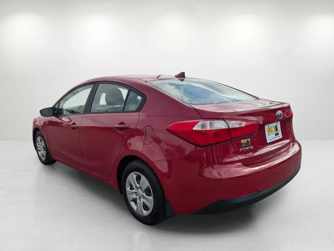 2016 /Black Kia Forte LX (KNAFK4A61G5) with an Regular Unleaded I-4 1.8 L/110 engine, 6-Speed Manual w/OD transmission, located at 1430 Gateway Drive, Opelika, AL, 36801, (334) 239-0944, 32.637871, -85.409790 - 2016 Kia Forte LX - Photo#5