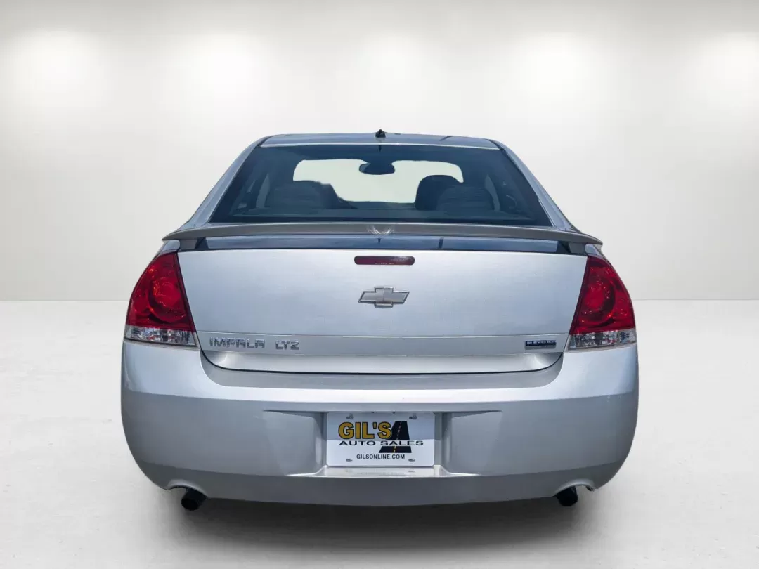 2012 /Ebony Chevrolet Impala LTZ (2G1WC5E38C1) with an Gas/Ethanol V6 3.6L/217 engine, 6-Speed Automatic transmission, located at 3959 U.S. 80 W, Phenix City, AL, 36870, (334) 297-4885, 32.469296, -85.135185 - 2012 Chevrolet Impala LTZ - Photo#5