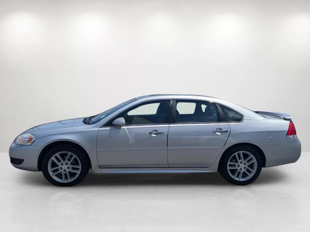 2012 /Ebony Chevrolet Impala LTZ (2G1WC5E38C1) with an Gas/Ethanol V6 3.6L/217 engine, 6-Speed Automatic transmission, located at 3959 U.S. 80 W, Phenix City, AL, 36870, (334) 297-4885, 32.469296, -85.135185 - 2012 Chevrolet Impala LTZ - Photo#7