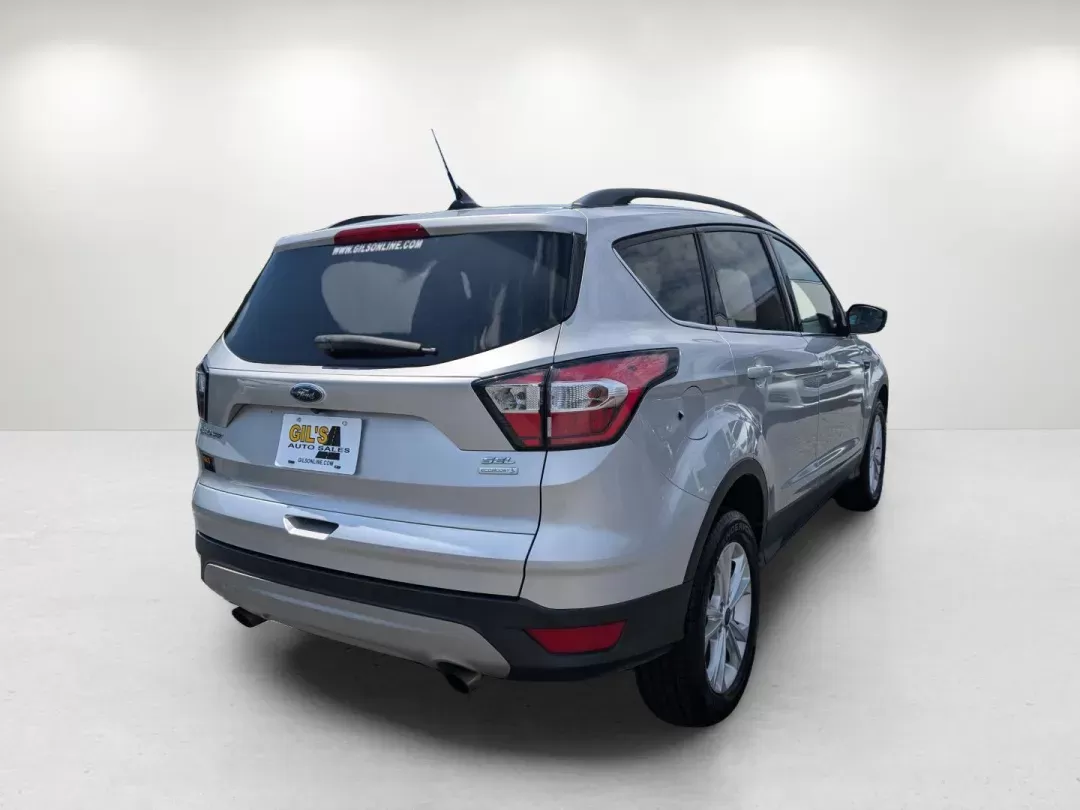 2018 Ford Escape SEL (1FMCU0HD7JU) with an Intercooled Turbo Regular Unleaded I-4 1.5 L/91 engine, 6-Speed Automatic w/OD transmission, located at 3959 U.S. 80 W, Phenix City, AL, 36870, (334) 297-4885, 32.469296, -85.135185 - 2018 Ford Escape SEL - Photo#5