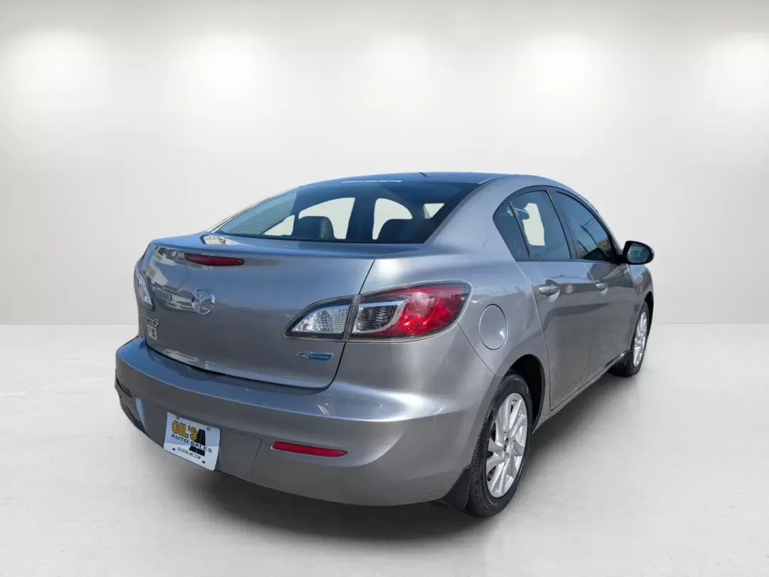 2013 Mazda Mazda3 i Grand Touring (JM1BL1W73D1) with an Gas I4 2.0L/122 engine, 6-Speed Automatic transmission, located at 521 Old Farm Lane Rd, Prattville, AL, 36066, (334) 325-1505, 32.482460, -86.416367 - 2013 Mazda Mazda3 i Grand Touring - Photo#4